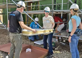 Volunteers at Twin Cities Habitat Window Install